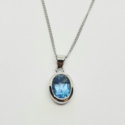 Silver Blue Topaz Oval Pendant And Chain SP1146BT